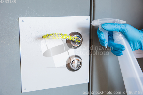 Image of Viruses on surfaces, door and window knobs you contacting everyday - concept of spreading of virus, disinfection