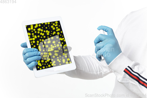 Image of Viruses on surfaces, tablet you contacting everyday - concept of spreading of virus, disinfection