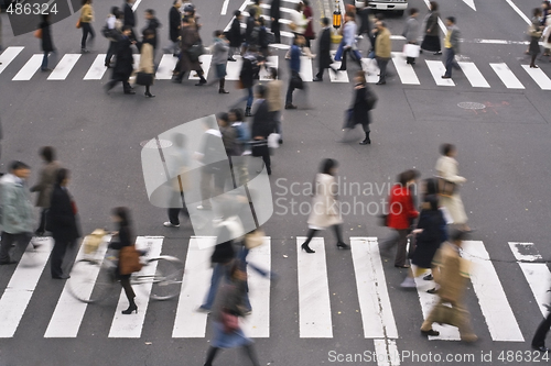 Image of People crossing the street