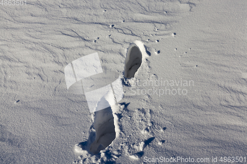 Image of footsteps in the snow