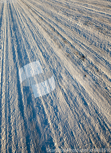 Image of compacted snow on the road