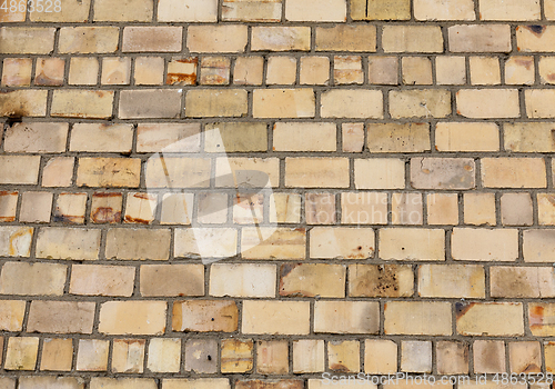 Image of yellow brick wall