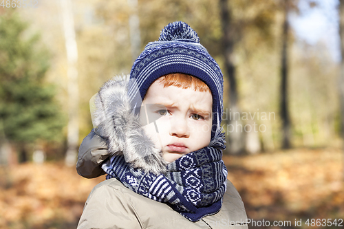 Image of Upset baby Autumn portrait