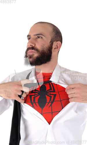 Image of Young handsome man showing his spider man shirt