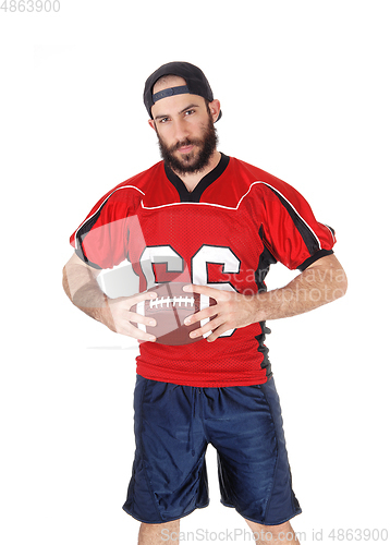 Image of Football player thinking of his next move