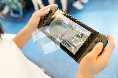 Image of Hong Kong, 19 May 2017 -: Hand holding Nintendo Switch