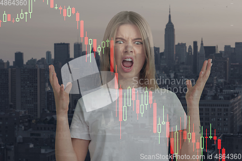 Image of Stressed woman holding head with hands on abstract city background. Double exposure with graphs. Virus alert, coronavirus pandemic, crisis, unemployment