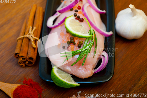 Image of fresh organic chicken breast with herbs and spices