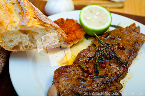Image of roasted grilled ribeye beef steak butcher selection