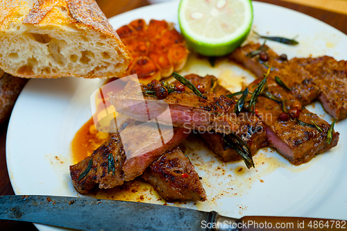 Image of roasted grilled ribeye beef steak butcher selection