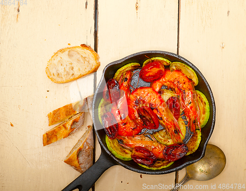 Image of roasted shrimps with zucchini and tomatoes