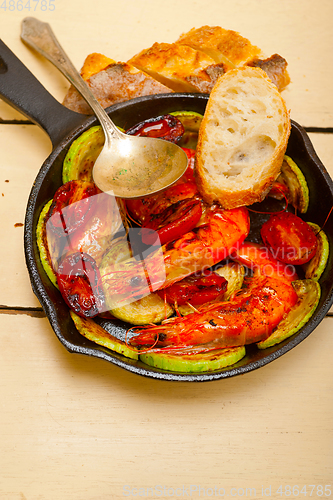 Image of roasted shrimps with zucchini and tomatoes