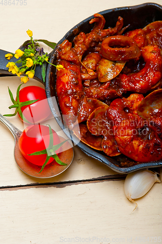 Image of fresh seafoos stew on an iron skillet