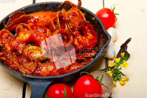 Image of fresh seafoos stew on an iron skillet