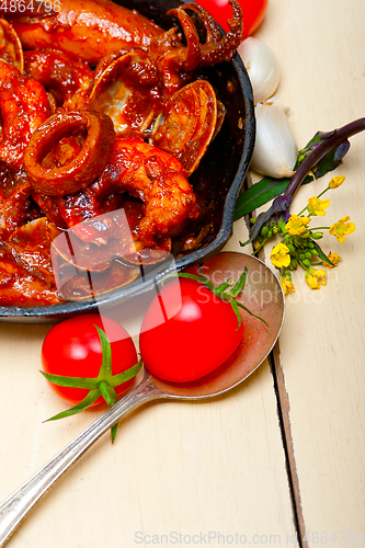 Image of fresh seafoos stew on an iron skillet