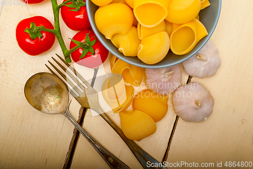 Image of Italian snail lumaconi pasta with tomatoes