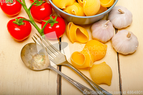 Image of Italian snail lumaconi pasta with tomatoes