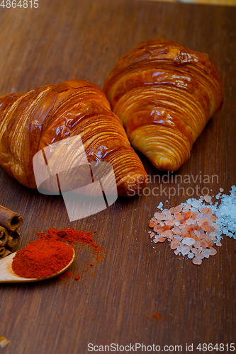 Image of french traditiona croissant brioche butter bread  on wood