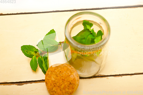 Image of fresh mint leaves on a glass jar