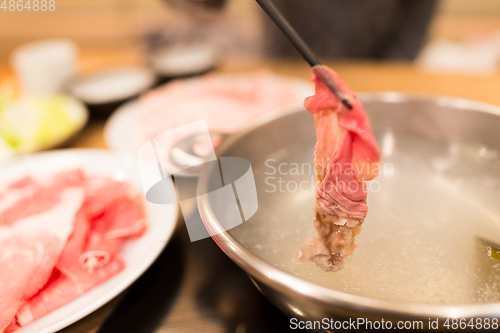 Image of Slice of beef for hot pot in japanese restaurant 