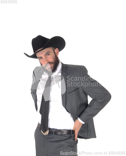 Image of Portrait of man in a suit and cowboy hat