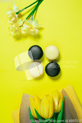 Image of Monochrome stylish composition in yellow color. Top view, flat lay.