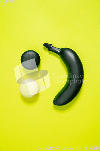 Image of Monochrome stylish composition in yellow color. Top view, flat lay.