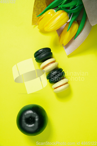 Image of Monochrome stylish composition in yellow color. Top view, flat lay.