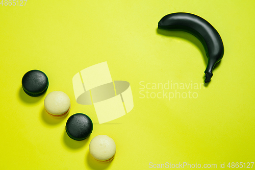 Image of Monochrome stylish composition in yellow color. Top view, flat lay.