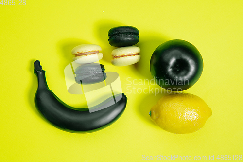 Image of Monochrome stylish composition in yellow color. Top view, flat lay.