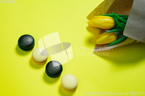 Image of Monochrome stylish composition in yellow color. Top view, flat lay.