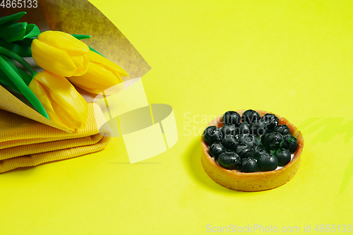 Image of Monochrome stylish composition in yellow color. Top view, flat lay.