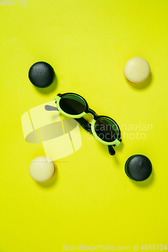 Image of Monochrome stylish composition in yellow color. Top view, flat lay.