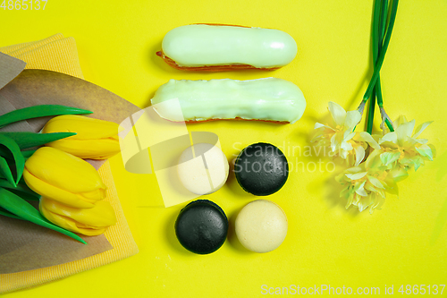 Image of Monochrome stylish composition in yellow color. Top view, flat lay.