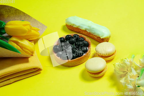 Image of Monochrome stylish composition in yellow color. Top view, flat lay.
