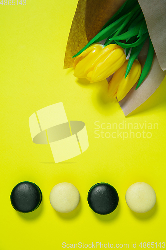 Image of Monochrome stylish composition in yellow color. Top view, flat lay.