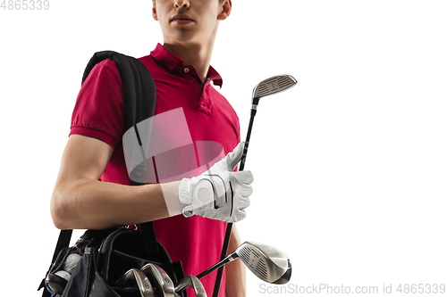 Image of Golf player in a red shirt training, practicing isolated on white studio background