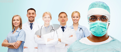 Image of indian doctor or surgeon and healthcare workers