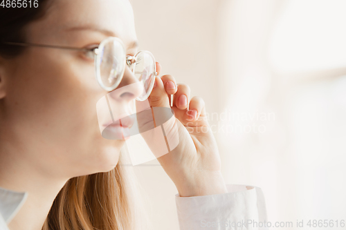 Image of Close up of caucasian female hands, working in office, business, people