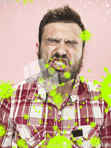 Image of Caucasian man sneezing, illustration of virus spreading, stop epidemic of coronavirus