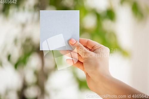 Image of Close up of caucasian female hands during working in office, studying