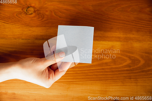 Image of Close up of caucasian female hands during working in office, studying