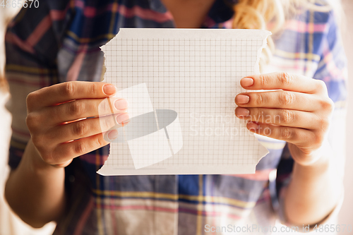 Image of Close up of caucasian female hands during working in office, studying