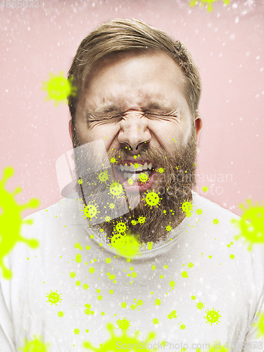 Image of Caucasian man sneezing, illustration of virus spreading, stop epidemic of coronavirus