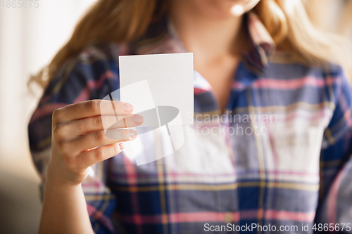 Image of Close up of caucasian female hands during working in office, studying