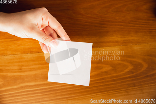 Image of Close up of caucasian female hands during working in office, studying