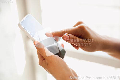 Image of Close up of caucasian female hands during working in office, studying