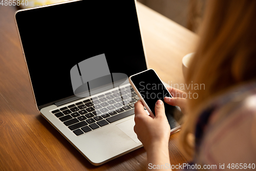 Image of Close up of caucasian female hands during working in office, studying