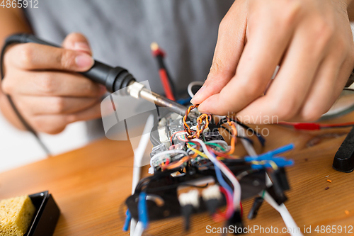 Image of Flying Drone building at home