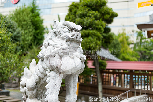 Image of Lion statue in Japanese garden